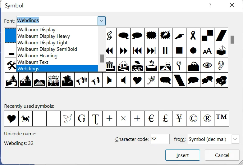 The Symbol dialog box with the Font list open and Webdings chosen. The grid shows picture symbols. Below it are Recently used symbols such as a heart, ±, €, £, ¥, © and ™, the Unicode name, and Character code 32 from Symbol (decimal). Insert and Cancel buttons.